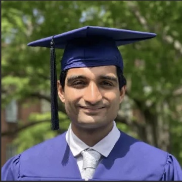 Stavan Jain in graduation cap and gown